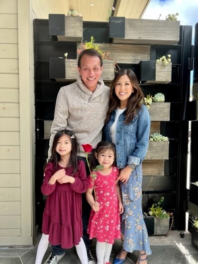 Kristin Lin posing with husband, Bruce, and children, Sophia and Karissa