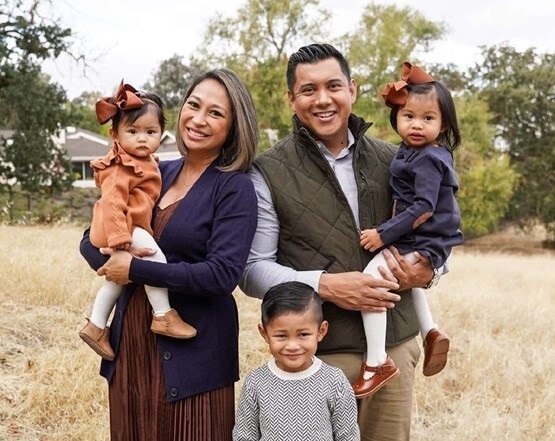 Jourdan Sy posing with his wife, Gigi, and children, Caden, Cameron and Charlotte